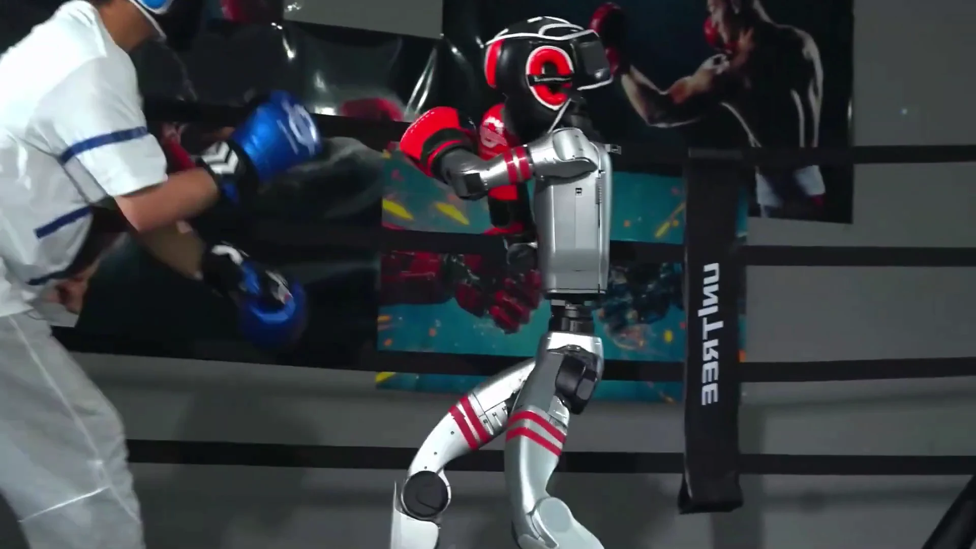 Unitree G1 humanoid robot in pre-event warmup sequence — spare battery included in Full-Service Event packages
