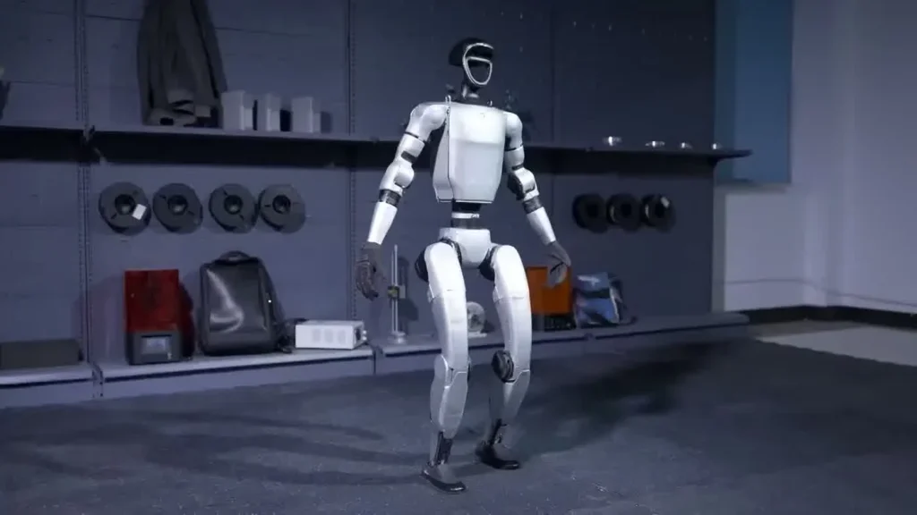 Unitree G1 humanoid robot at a trade show booth with branded signage under bright exhibition lighting