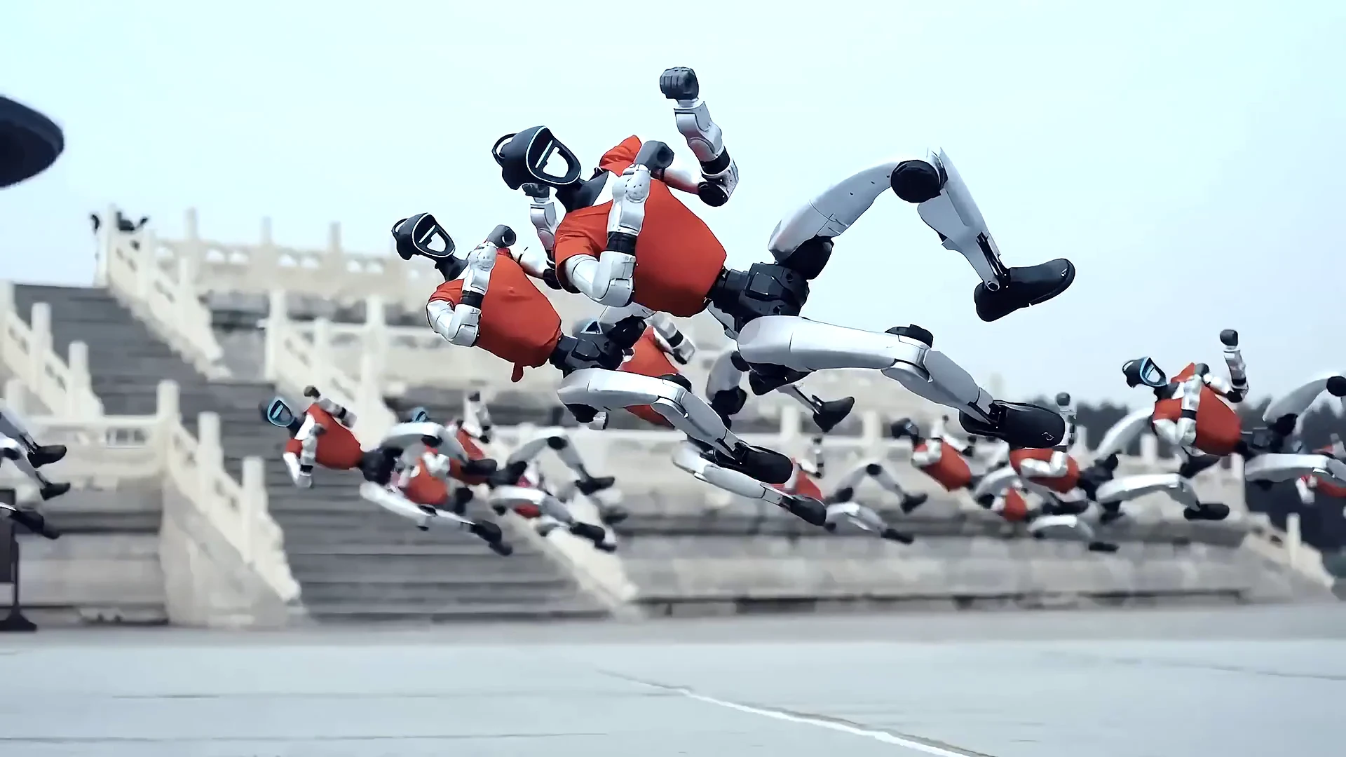 Unitree G1 humanoid robot performing kung fu routine showcasing agility and full-body coordination at live event