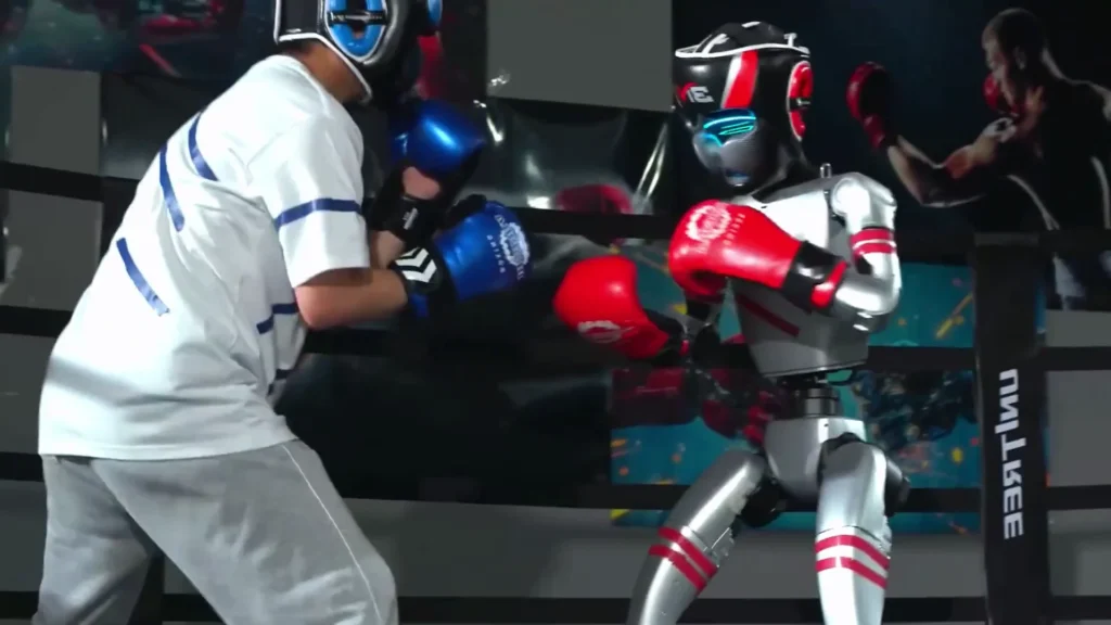 Unitree G1 humanoid robot performing floor recovery maneuver — getting up from the ground is a key capability test