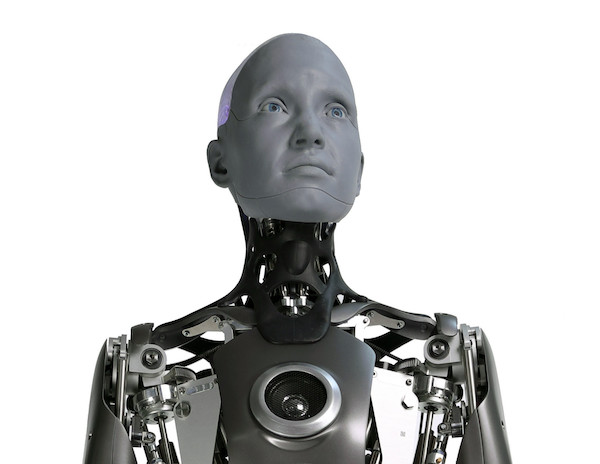 Ameca humanoid robot by Engineered Arts looking upward with expressive face displaying articulated head movement at CES 2022