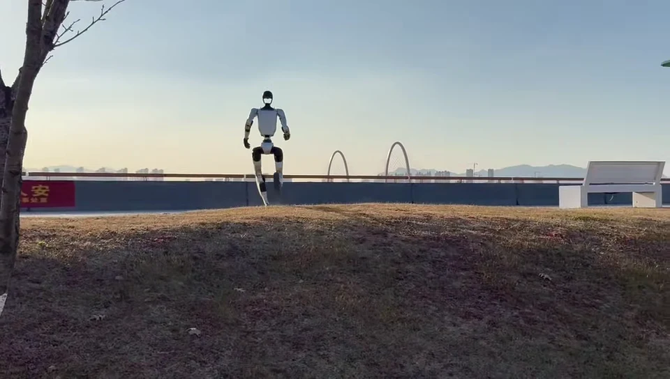 Unitree G1 humanoid robot walking outdoors demonstrating full 41-DOF autonomous mobility for event rental