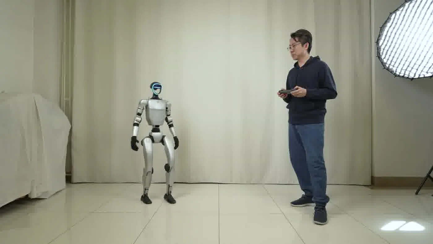 Unitree G1 humanoid robot at an indoor networking reception event with professional event decor and attendees nearby