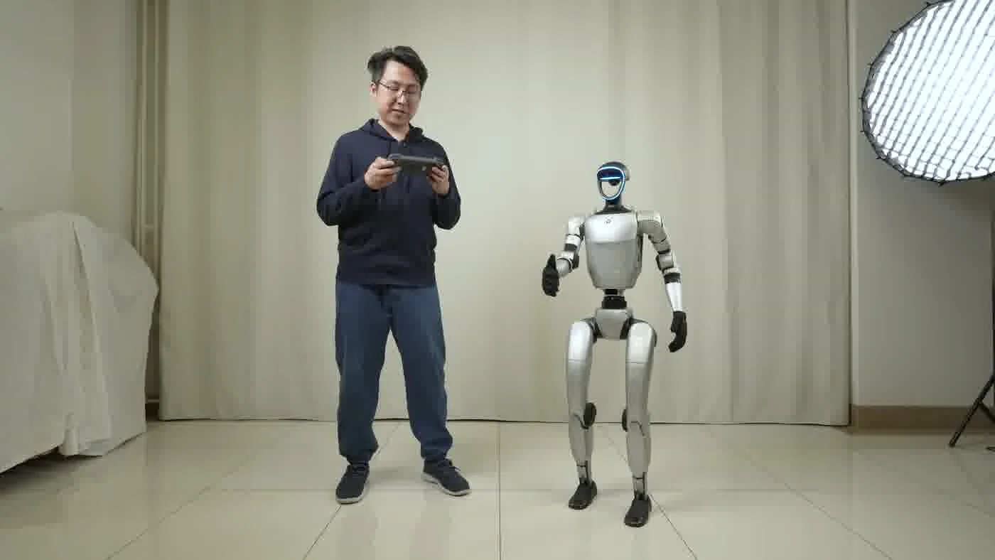Unitree G1 humanoid robot during a posed photo moment at a formal indoor event showing the photo activation use case