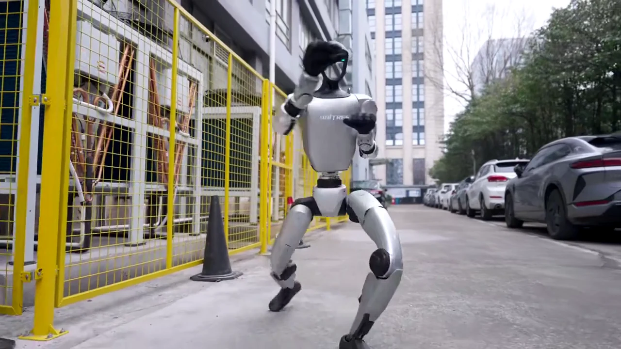 Unitree G1 humanoid robot walking in an urban environment after an event deployment and teardown