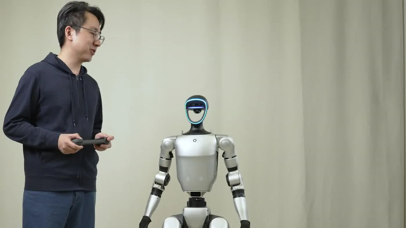 Unitree G1 humanoid robot active on a convention center exhibition floor during a brand activation event