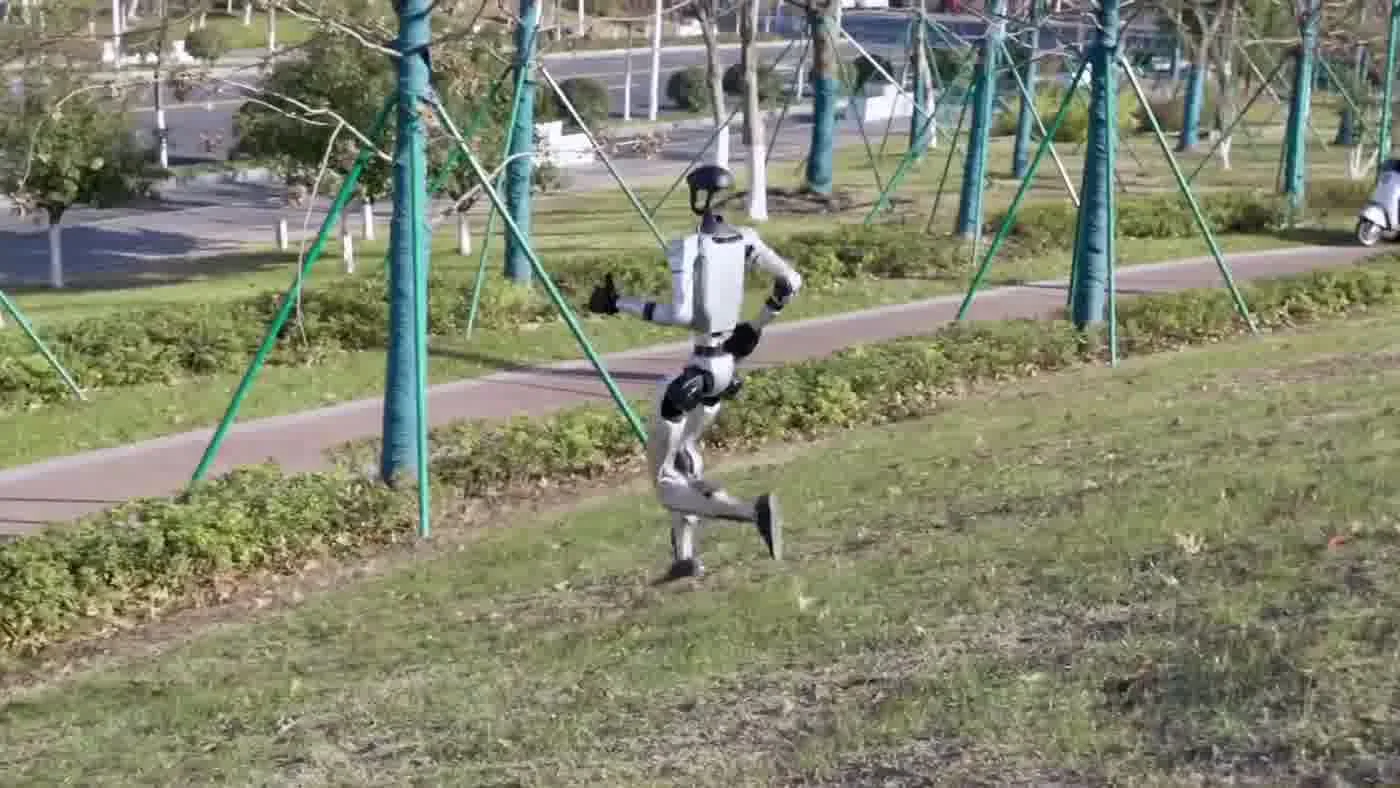 Unitree G1 humanoid robot on-site at a live event venue during event day operations with staff coordinating logistics