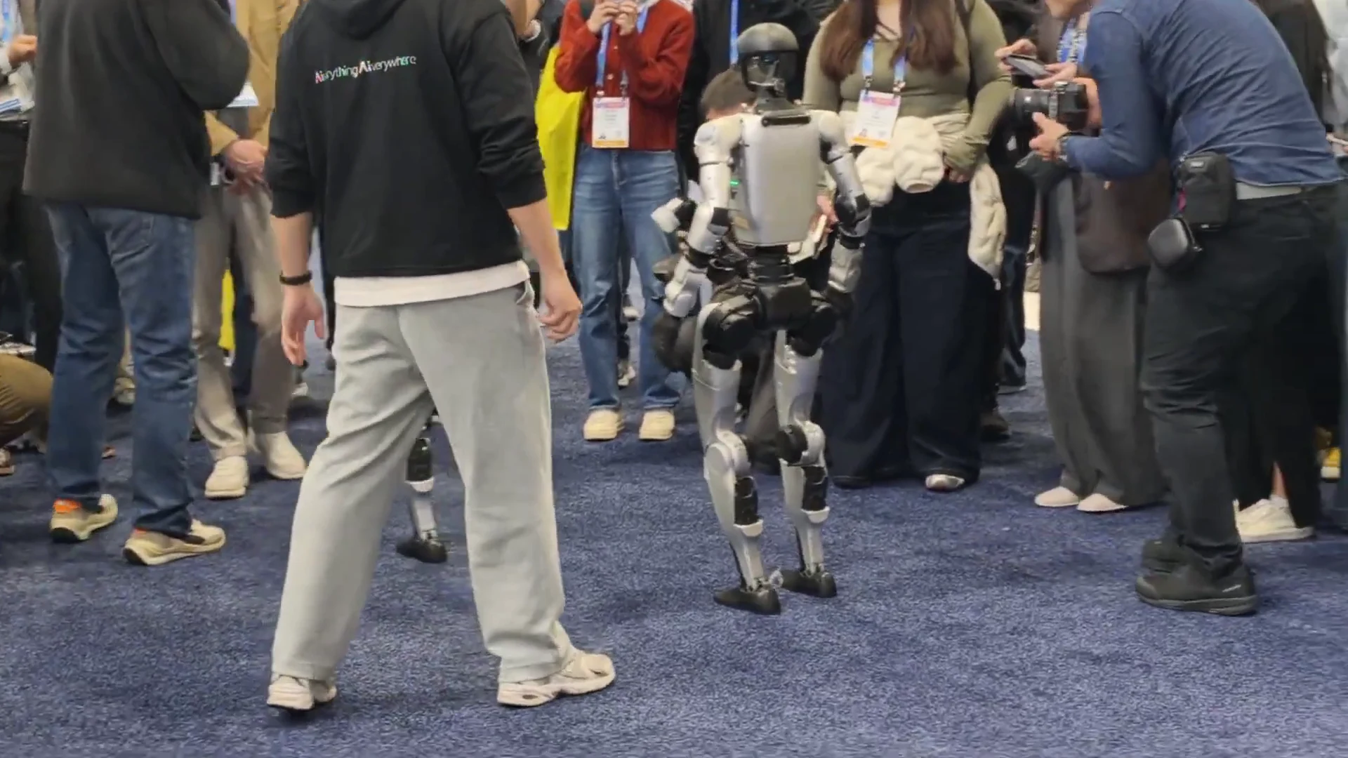 Unitree G1 humanoid robots at a CES Las Vegas trade show in Full-Service Event operator configuration for robot rental