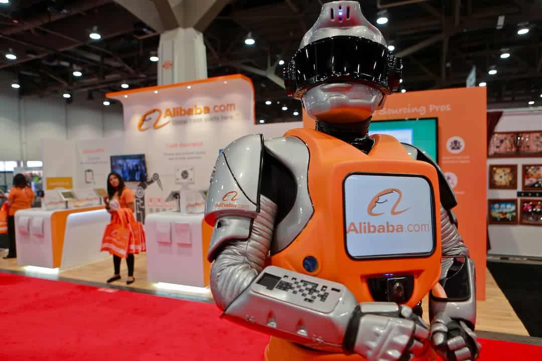 Robot entertainer at a Las Vegas trade show booth engaging a crowd of event attendees on the floor