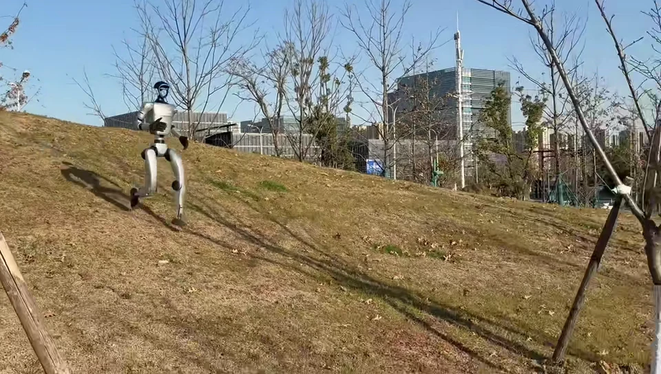 Unitree G1 humanoid robot jogging outdoors, showing the G1 mobility used in retail and public brand activations