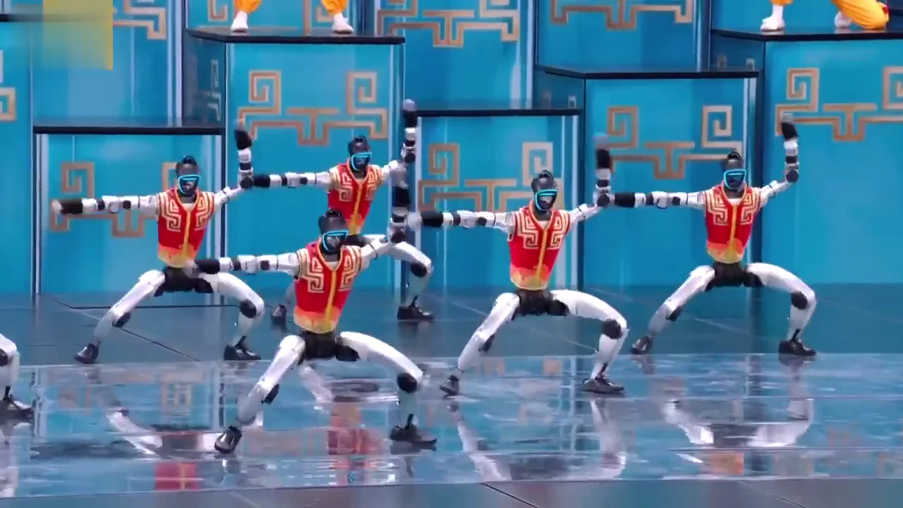 Multiple Unitree G1 robots on stage at a brand performance event, showing multi-robot activation deployment