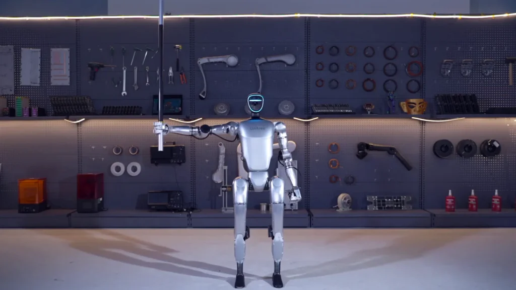 Unitree G1 humanoid robot during indoor setup at a science center exhibit orientation session