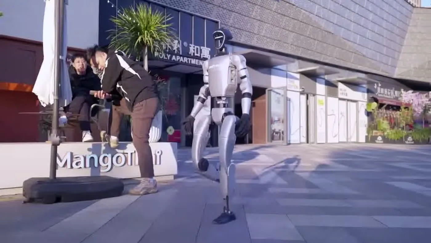 Unitree G1 humanoid robot demonstrating standard booking inclusions with hardware and accessories at an event