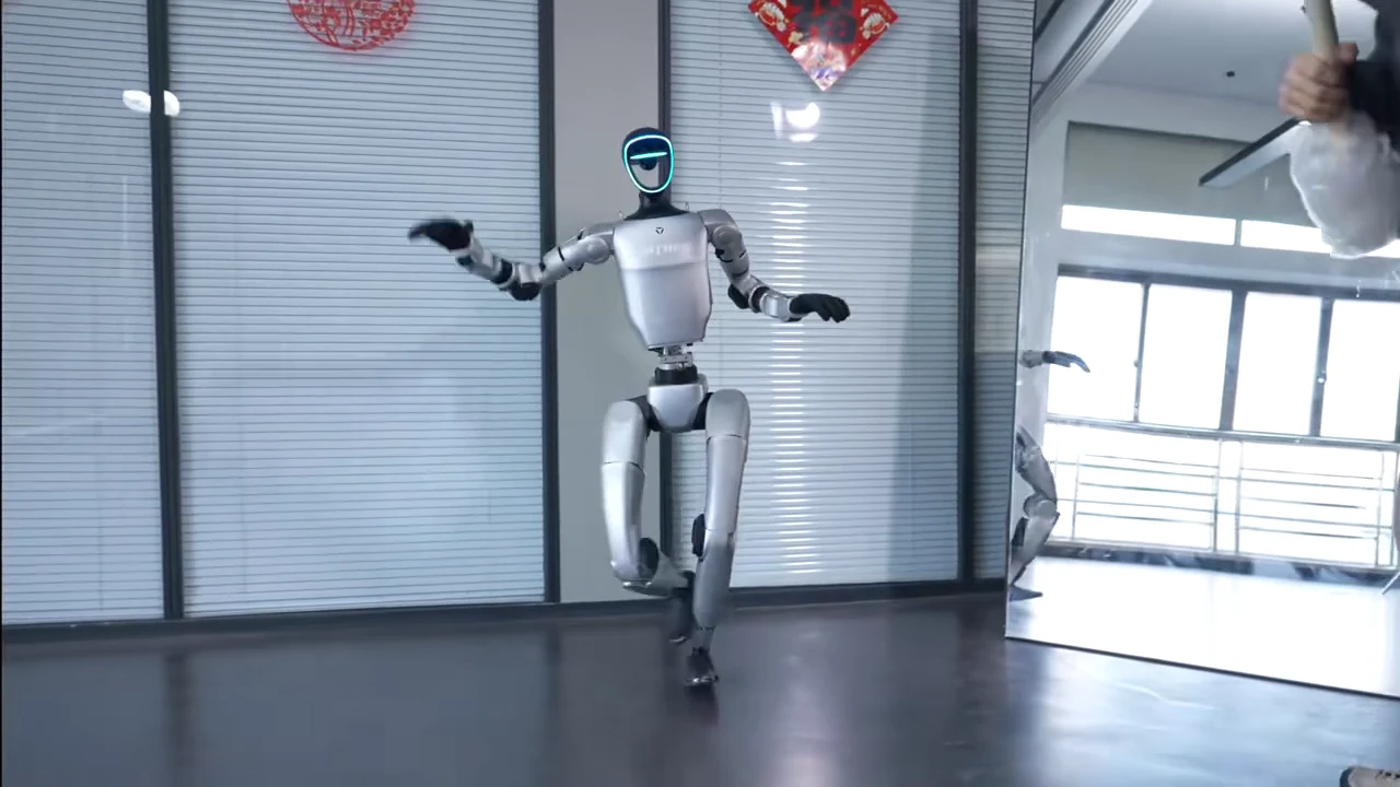 Unitree G1 performing a fluid dance routine indoors showing the full range of its 41 degrees of freedom