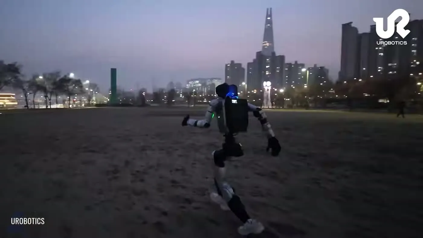 Unitree G1 humanoid robot walking at 2 m/s demonstrating event-ready mobility and BrainCo Revo 2 hands