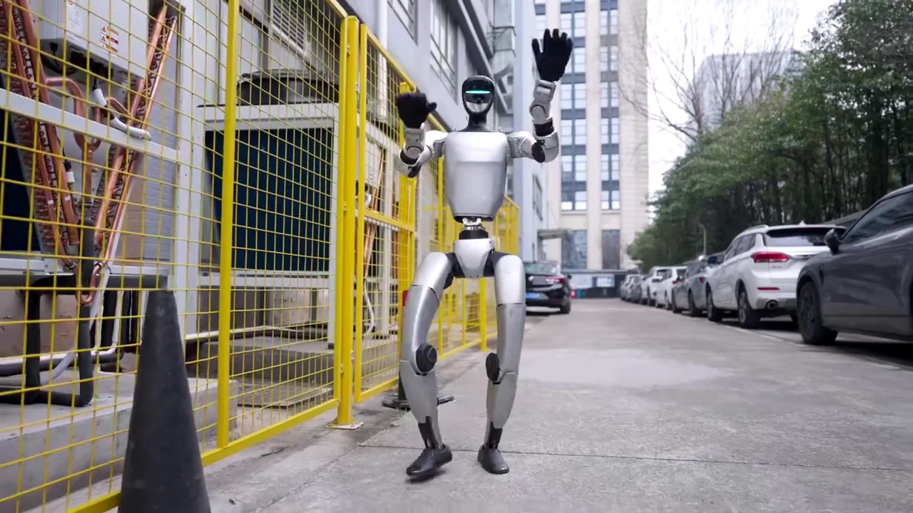 Unitree G1 humanoid robot walking outdoors in an urban environment demonstrating mobility and physical capability in public