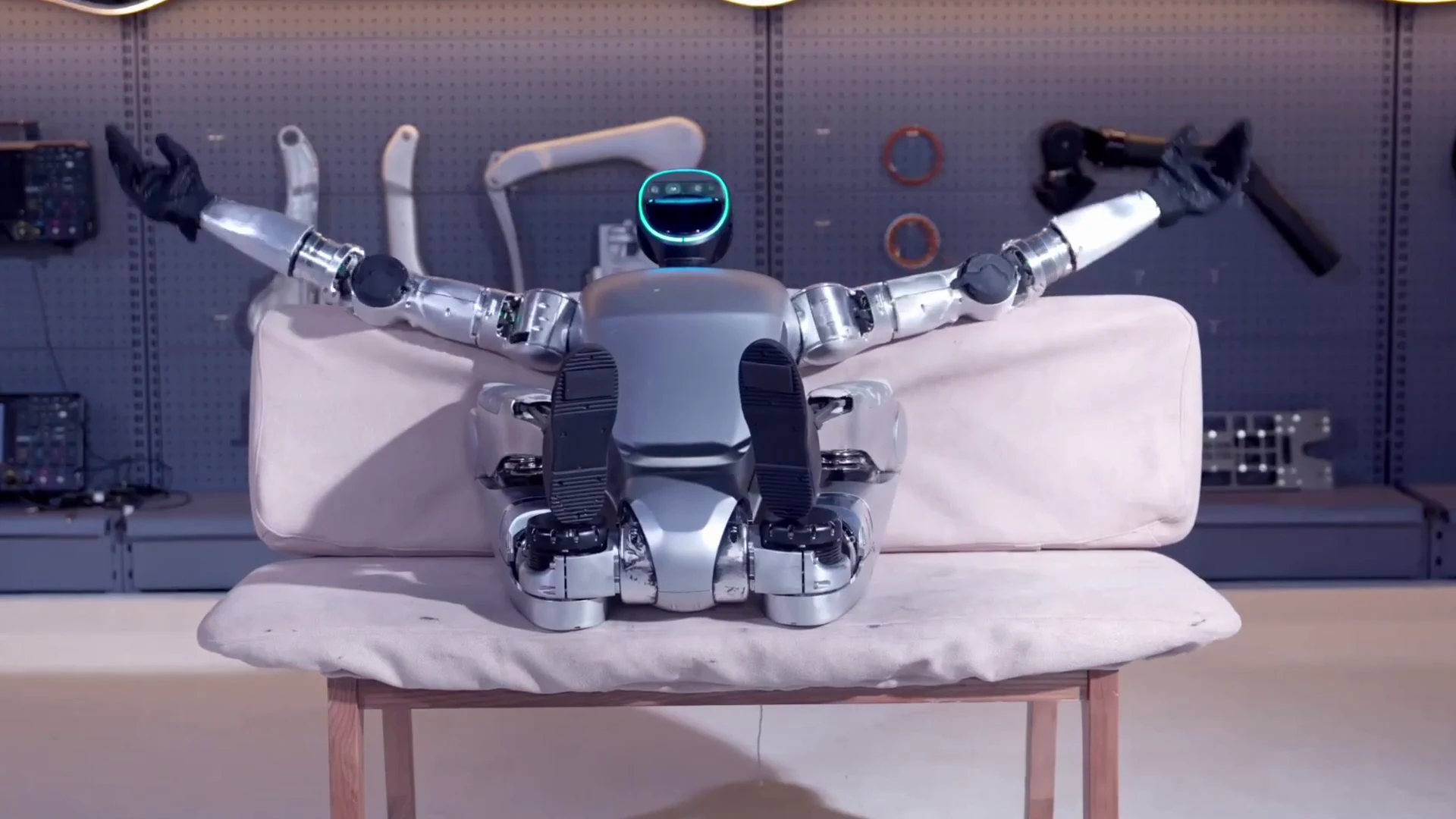 Unitree G1 humanoid robot floor recovery sequence showing the balance algorithms that make bipedal walking possible
